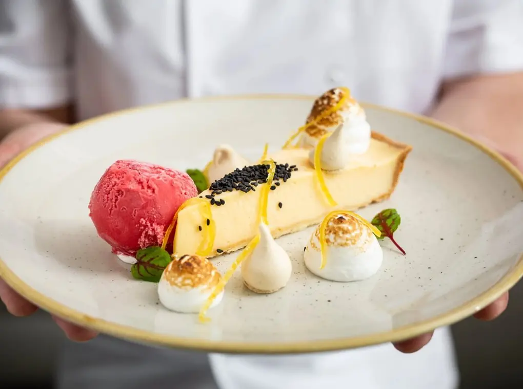 Chef holding dessert Medium