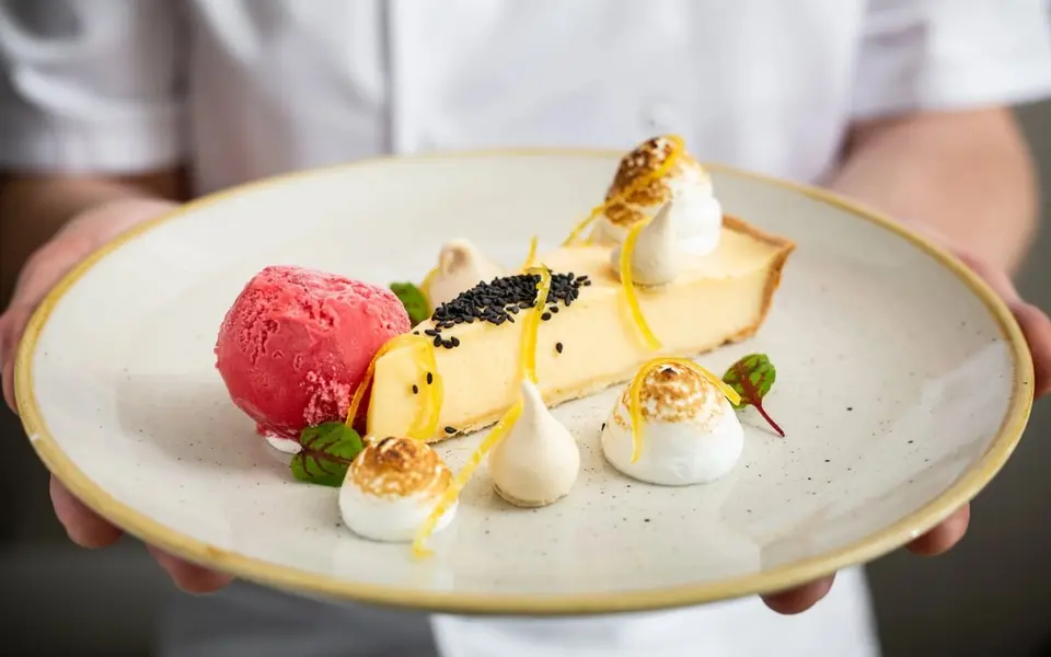 Chef holding dessert Medium